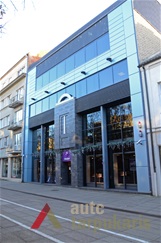 Sklypo (dab. Laisvės al. 43-45) buvusiuose pastatuose veikė Elenos Jonavičienės moteriškų rūbų siūvykla ir Josefo Rozalskio teksitlės krautuvė. 2014 m. P. T. Laurinaičio nuotr.